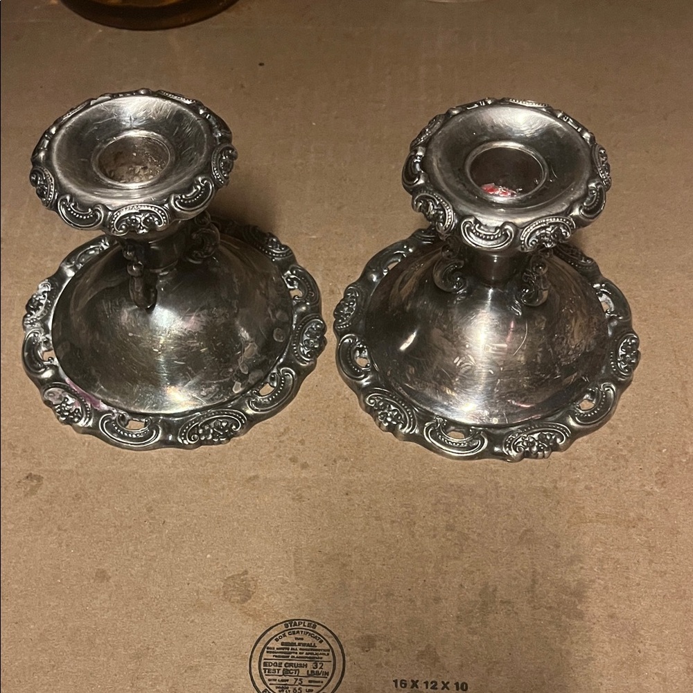 Elegant Silver  Plate candle Holders
Has high relief, Vintage
